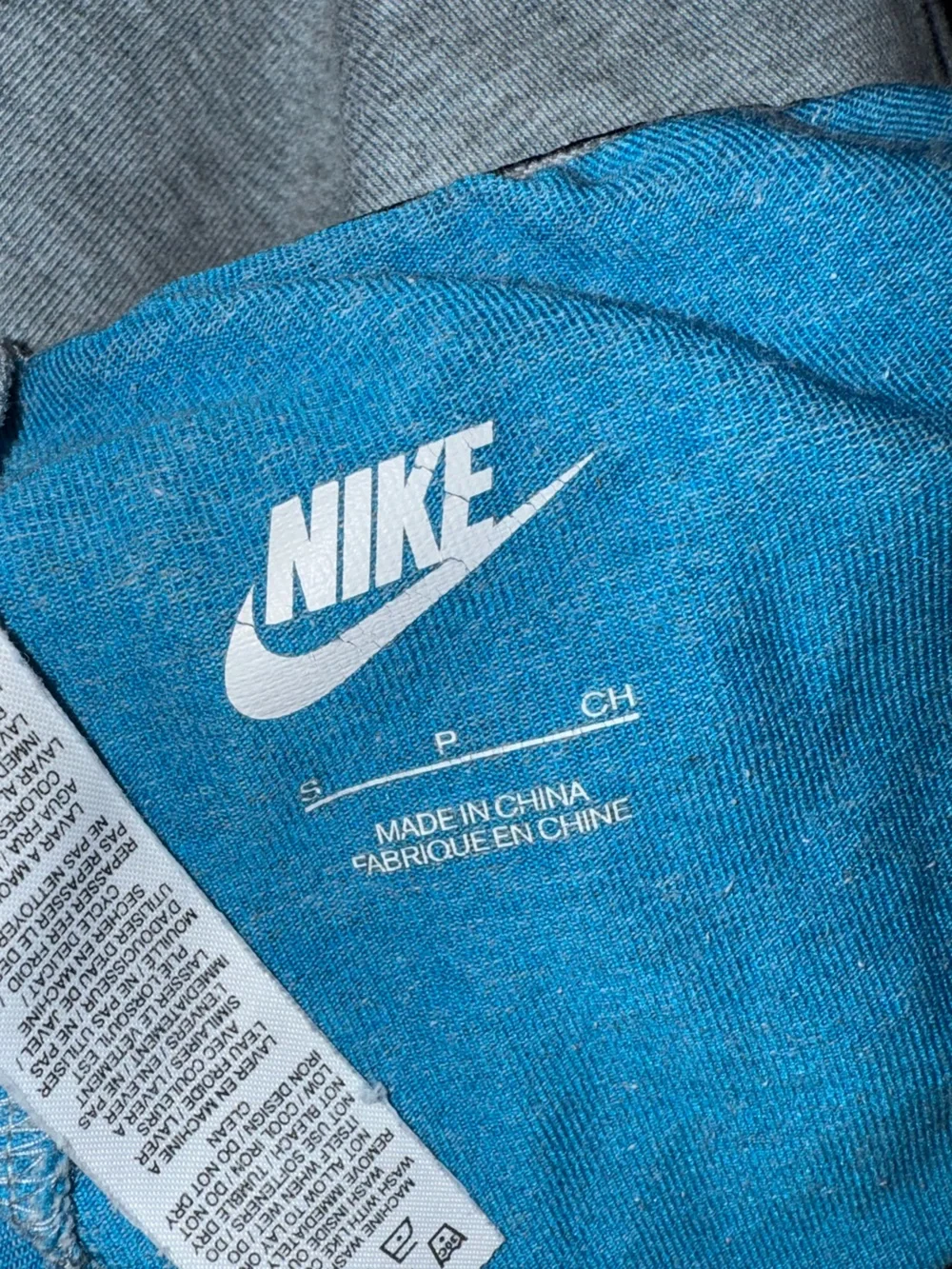 Nike Gray leggings with Blue Swoosh Logo